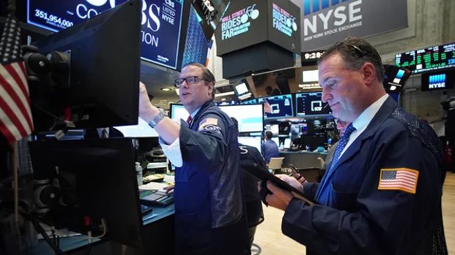 Dow rises following changes in benchmark